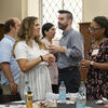 Group of faculty at orientation in Shusterman hall