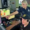 Temple Police Sgt. Lauren Boone watches over inside the dispatch center.