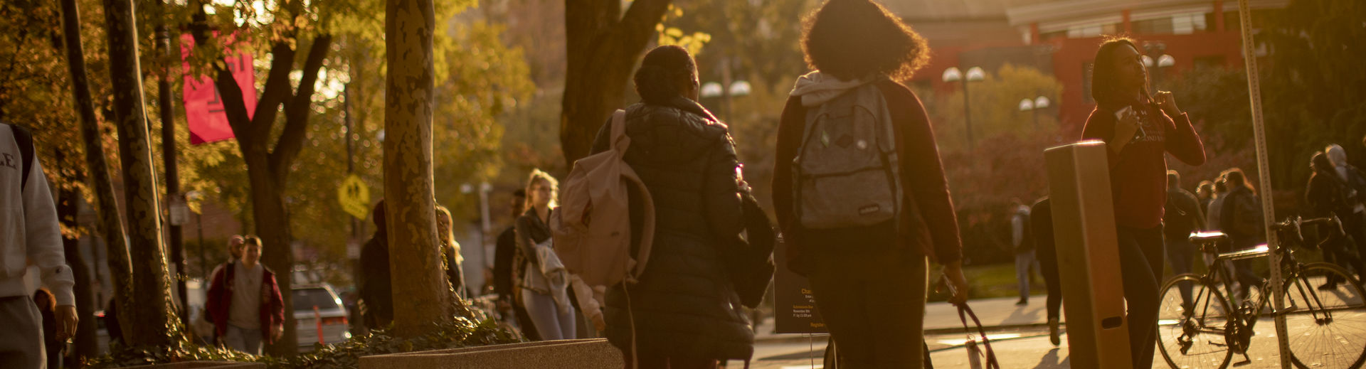 Students walking on campus in Fall