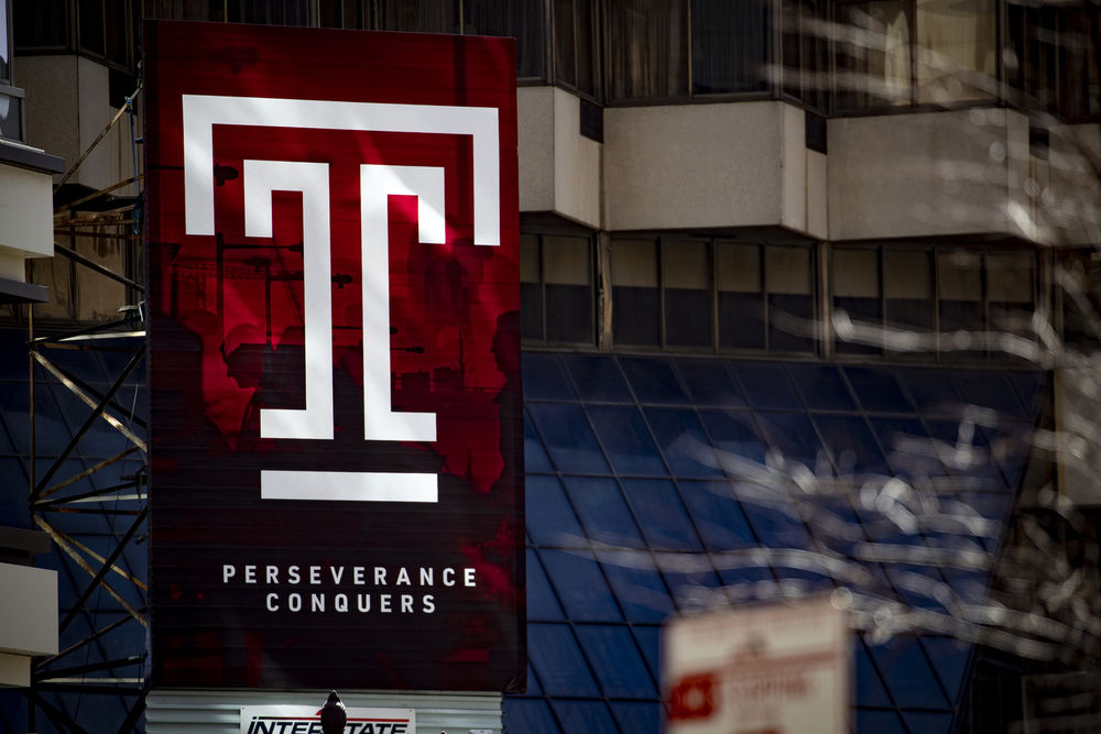 Temple T on a billboard in center city