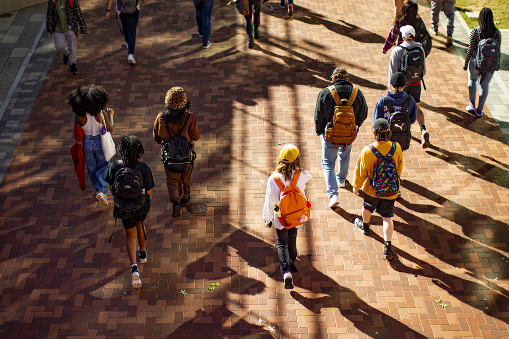 Students walking on Polett Walk on main campus